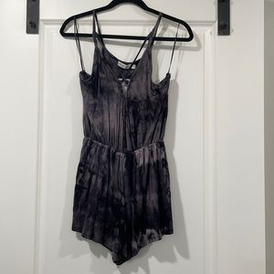 Tie dye romper with criss cross. NEW